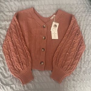 Pink women’s cardigan